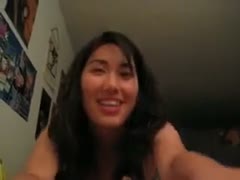 An attractive Asian playgirl with petite breasts engulfs a knob by her little throat.